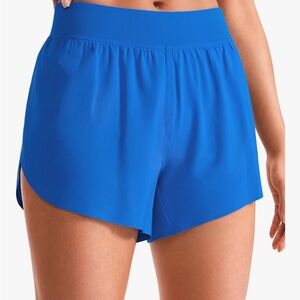 CRZ YOGA Mid Rise Dolphin Athletic Shorts Royal Blue